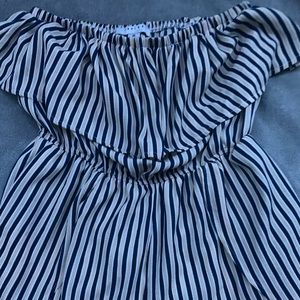 One yellow-orange shirt and a romper